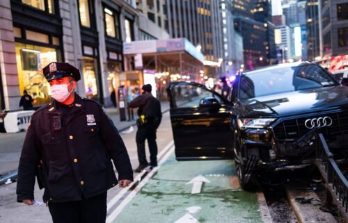 The NYPD at the scene of a suspected carjacking just north of Times Square on January 12. The number of carjackings quadrupled in New York City over the last four years.