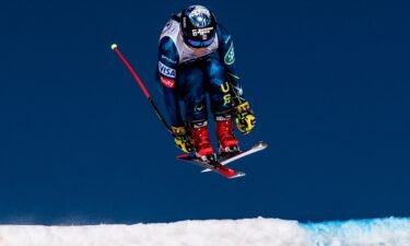 Breezy Johnson speeds down the course during downhill training
