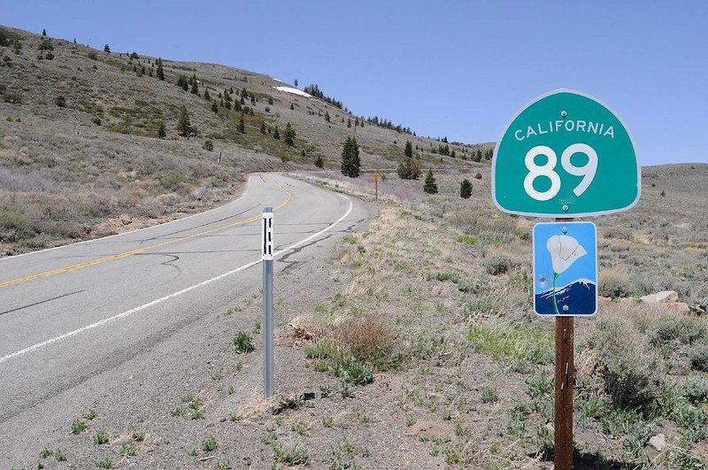 California Route 89, which connects the Sierra Nevada to the southern Cascade Range, is among the 50,000 miles of highways and freeways managed by Caltrans