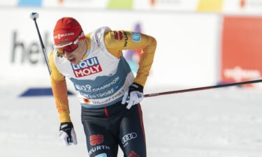 Nordic Combined Skier Eric Frenzel in action with poles in hand during the team event