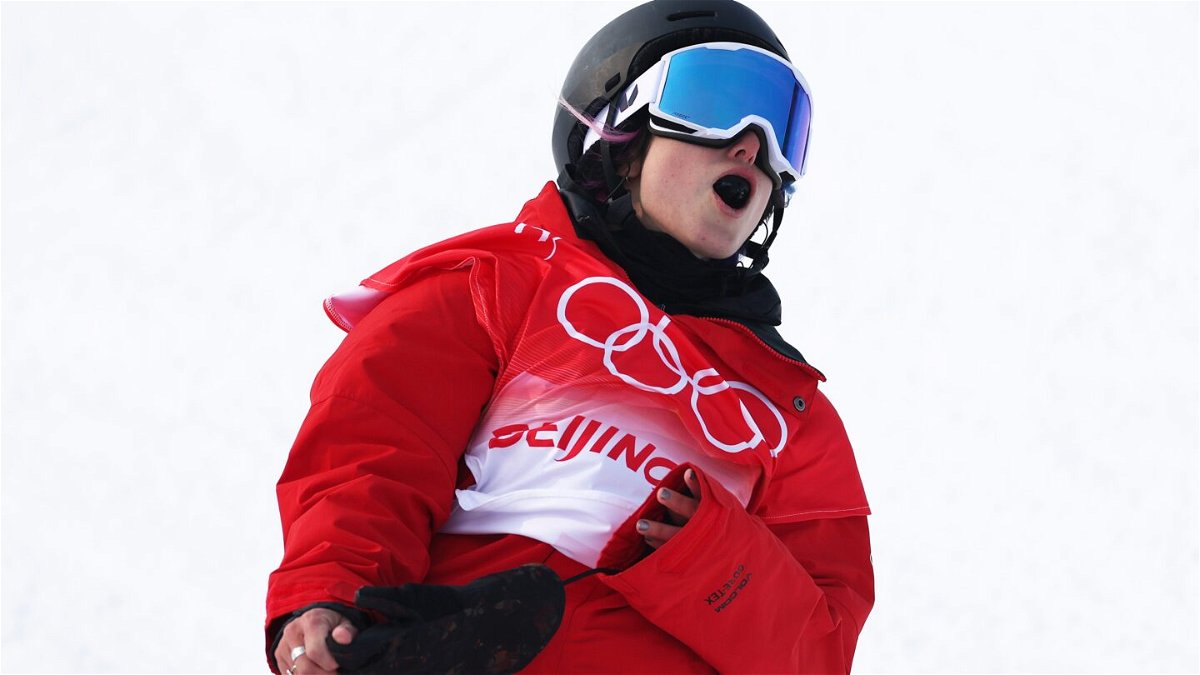 Jenise Spiteri reacts during women's snowboard halfpipe qualifying
