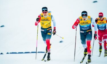 Cross-country skier Johannes Hoesflot Klaebo races in front of competition through snow