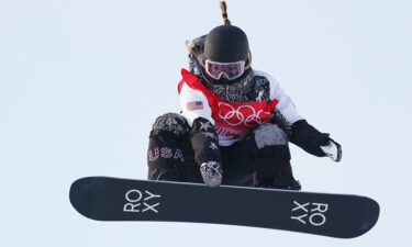 Chloe Kim performs a trick on a practice run during the Women's Snowboard Halfpipe Qualification