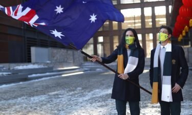 Laura Peel holds the Australian flag