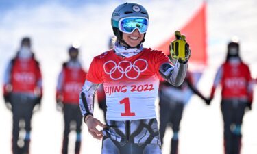 Ester Ledecka celebrates after the snowboard women's parallel giant slalom