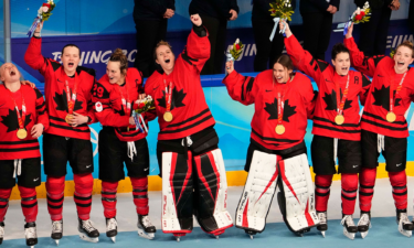 Canada celebrates winning the gold medal.
