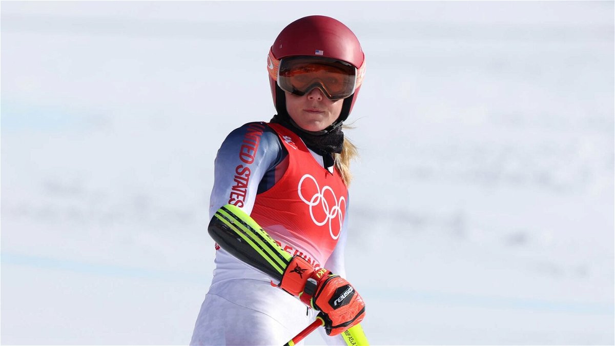 Mikaela Shiffrin stands in skiing gear