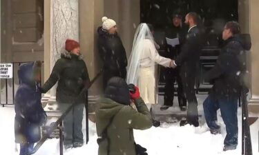 Sally Wilson Faulkner and Adam Edward held a wedding at Providence Public Library in Rhode Island during a winter storm.