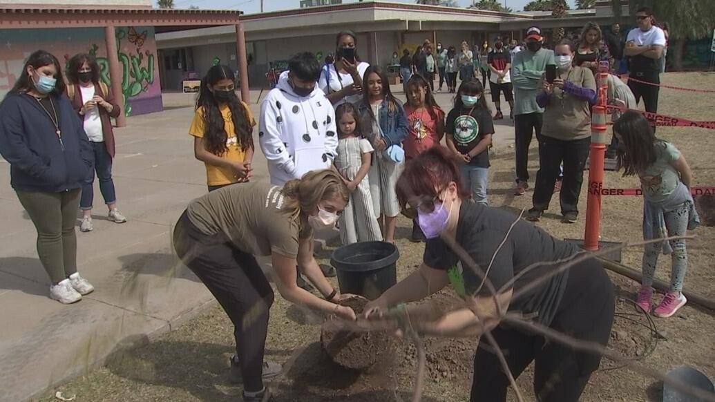 <i>KPHO KTVK</i><br/>Students and teachers at Emerson Elementary School celebrated the school's 100th anniversary by planting 100 trees and various plants.