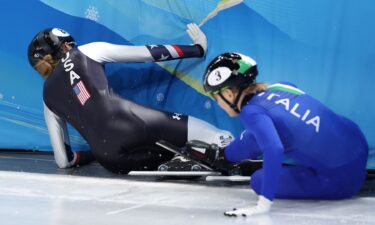 Kristen Santos and Arianna Fontana crash into the boards