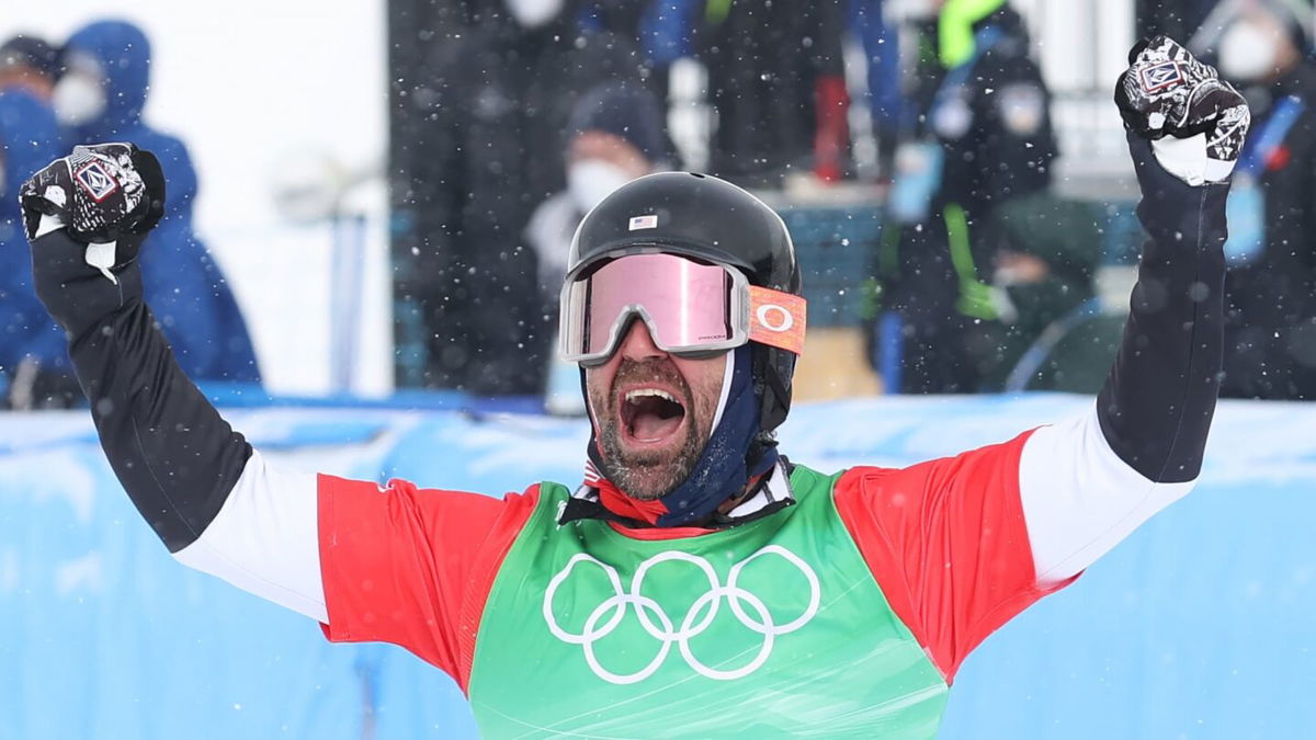 Nick Baumgartner of Team USA celebrates after victory on Day 8 of the 2022 Winter Olympics