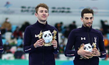 Bronze medalists Team USA pose during the men's team pursuit finals flower ceremony on Day 11 of the 2022 Winter Olympics