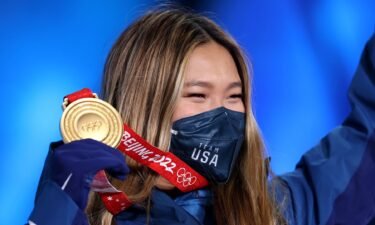 Gold medalist Chloe Kim of Team United States poses with their medal during the Women's Snowboard Halfpipe medal ceremony
