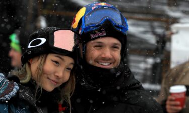 Louie Vito hugs fellow snowboarder Chloe Kim