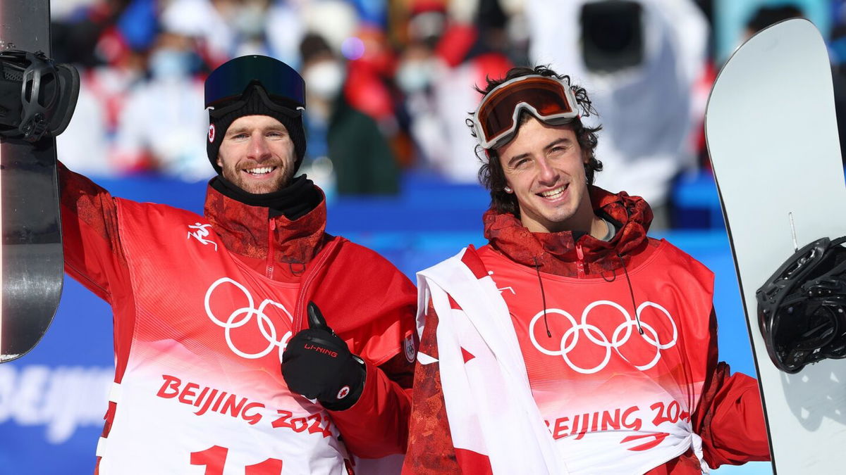 Max Parrot and Mark McMorris celebrate winning medals after incredible fights