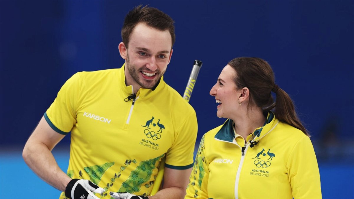 Dean Hewitt and Tahli Gill of Australia celebrate an unlikely win over Team Canada