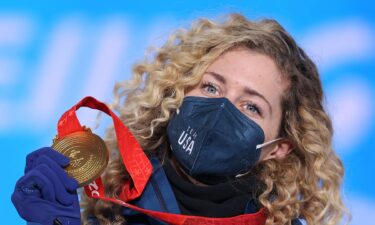 Gold medalist Lindsey Jacobellis of Team USA poses with their medal during the Women's snowboard cross medal ceremony