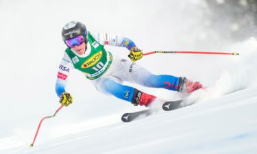Breezy Johnson makes a turn during an Alpine skiing race