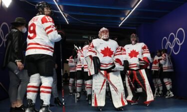 Team Canada look on prior to their match against Team ROC.