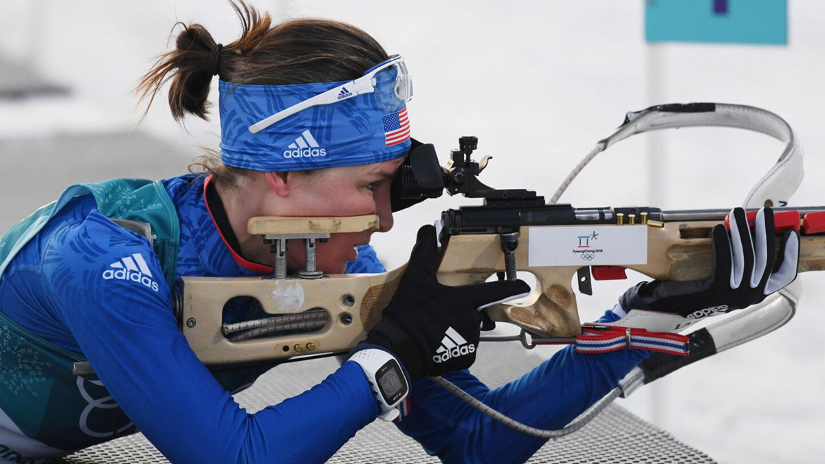 Clare Egan shooting during an Olympic biathlon event