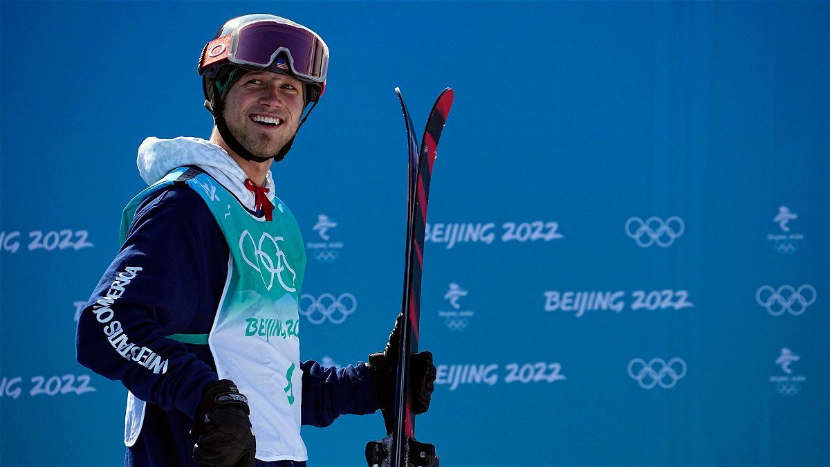 Colby Stevenson holds his skis