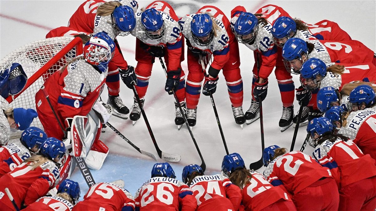 Czech hockey players gather at the Olympics.