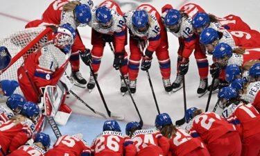 Czech hockey players gather at the Olympics.