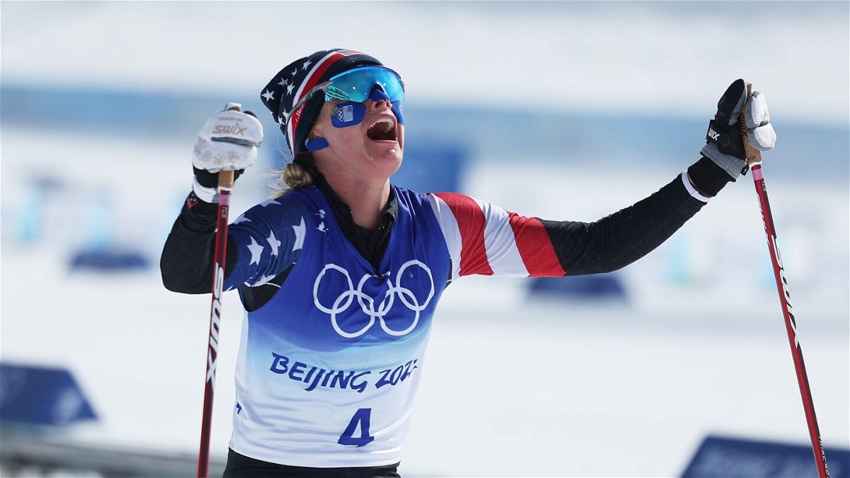 Jessie Diggins of Team United States celebrates winning silver during the Women's Cross-Country Skiing 30k Mass Start Free on Day 16 of the Beijing 2022 Winter Olympics