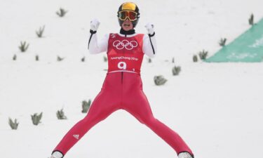 Eric Frenzel (GER) reacts after he jumps.