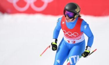 Sofia Goggia celebrates a silver-medal performance in the women's downhill at the 2022 Winter Olympics