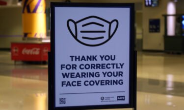 A face mask advisory sign is posted at Crypto.com Arena during an NBA game between the Los Angeles Lakers and the Sacramento Kings.