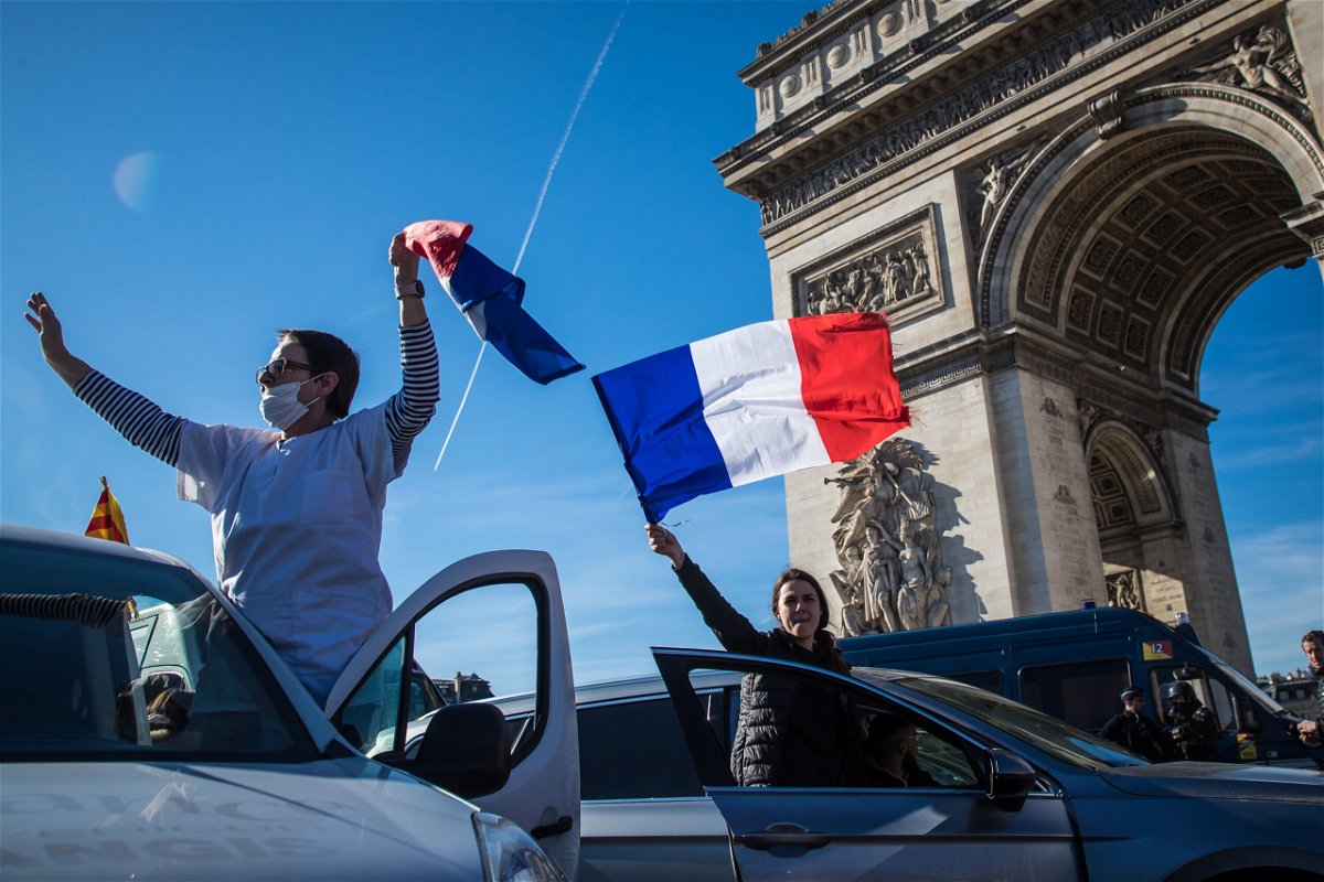 <i>Christophe Petit Tesson/EPA-EFE/Shutterstock</i><br/>Protesters blocked traffic at the Arc de Triomphe in the French capital on February 12.