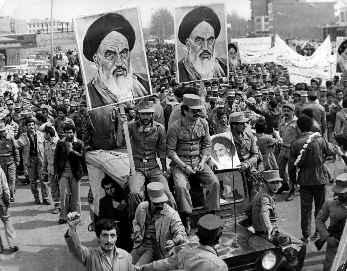 <i>Keystone/Hulton Archive/Getty Images</i><br/>The Iranian Islamic Republic Army demonstrates in solidarity with people in the street during the Iranian revolution. They are carrying posters of the Ayatollah Khomeini