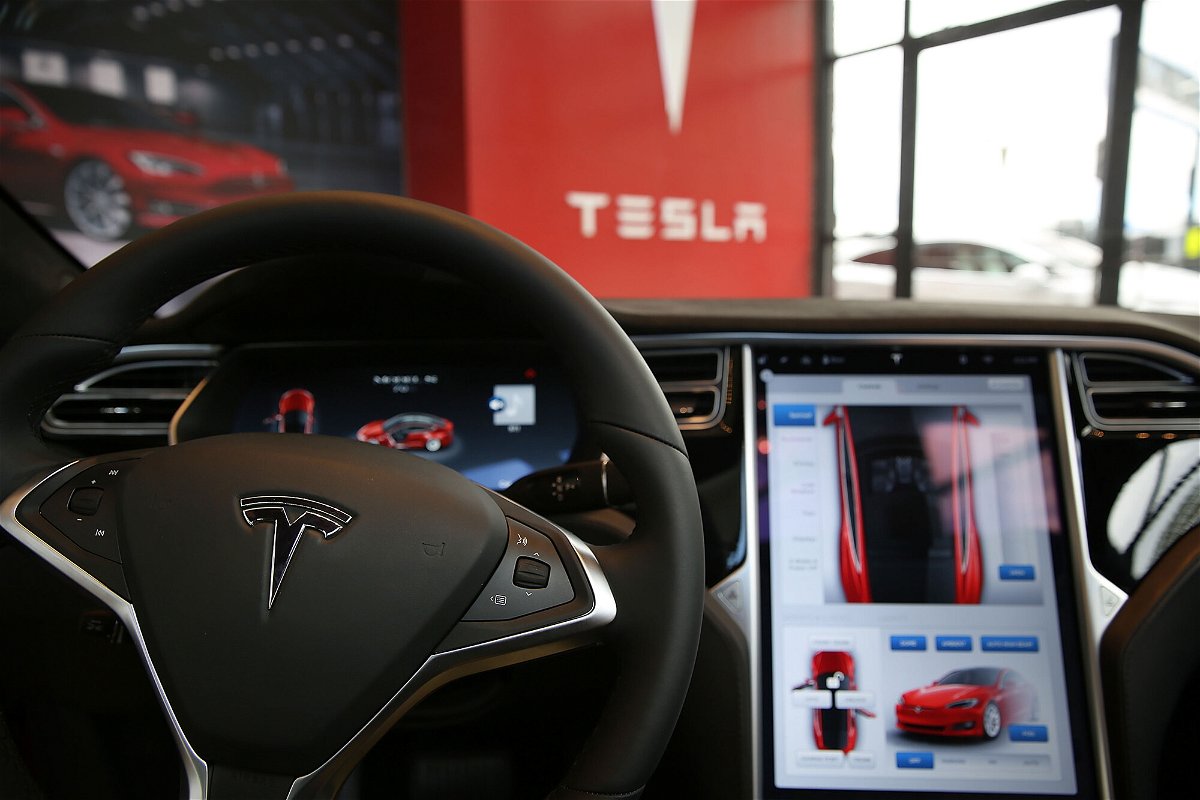 <i>Spencer Platt/Getty Images</i><br/>The inside of a Tesla vehicle is viewed as it sits parked in a new Tesla showroom and service center in Red Hook
