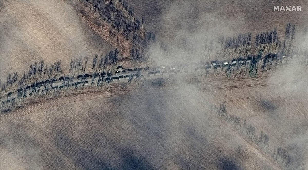 <i>Satellite image ©2022 Maxar Technologies</i><br/>New satellite images show a more than three-mile-long Russian military convoy on a roadway that heads toward the capital city.