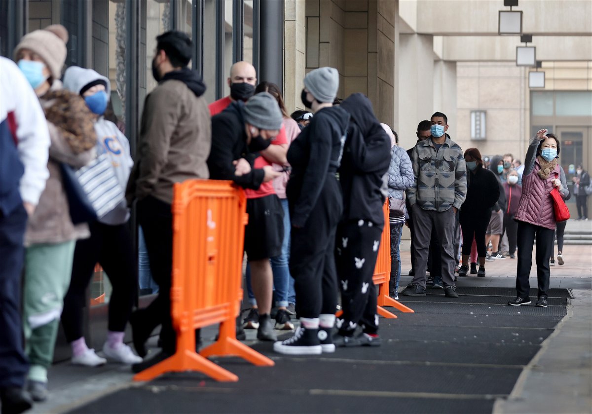<i>Mario Tama/Getty Images/FILE</i><br/>People wait in line to be tested for COVID-19 at Union Station on January 7