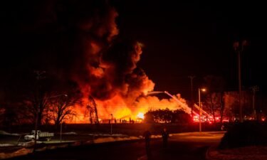 A fire burns Monday at the fertilizer plant in Winston-Salem