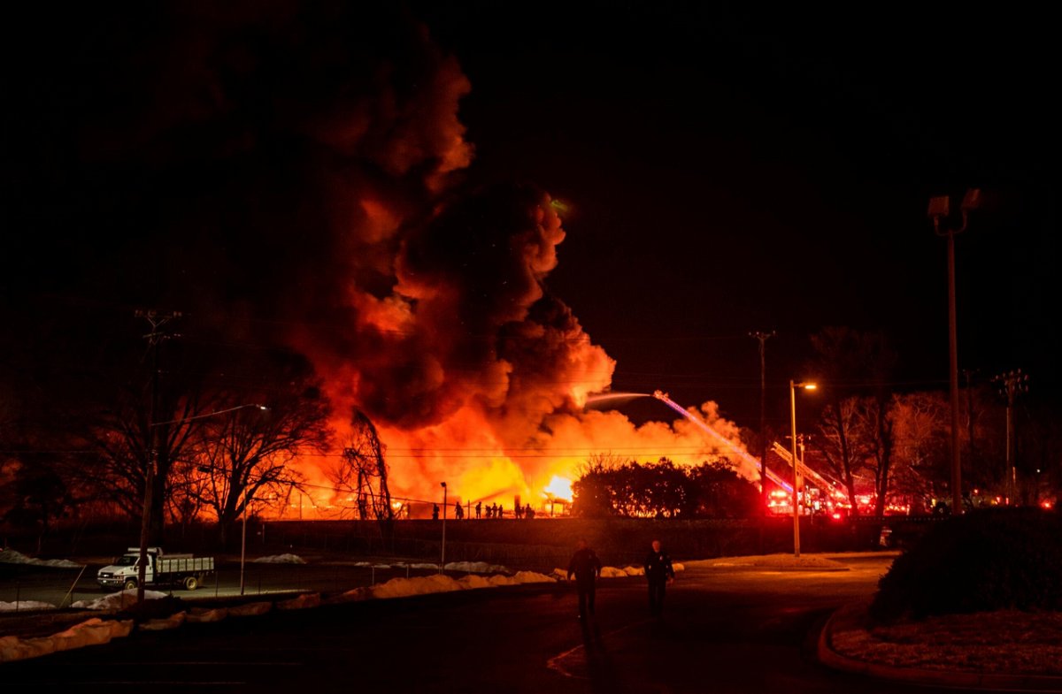 <i>Allison Lee Isley/Winston-Salem Journal/AP</i><br/>A fire burns Monday at the fertilizer plant in Winston-Salem