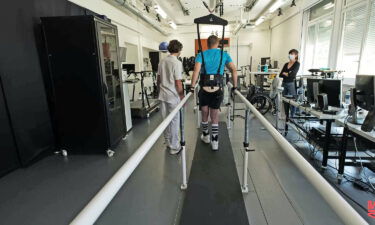 A 42-years-old patient performs training on a weight-supporting robot after having received a spinal cord implant within the STIMO Bridge research. He had been unable to move his legs for 1 year before he entered the project.