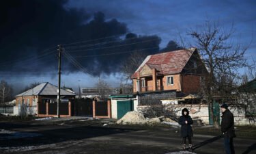 Black smoke rises from a military airport in Chuguyev near Kharkiv  on February 24