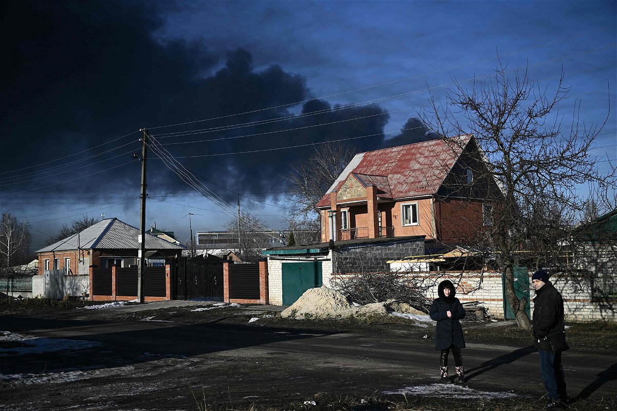 <i>Aris Messinis/AFP/Getty Images</i><br/>Black smoke rises from a military airport in Chuguyev near Kharkiv  on February 24