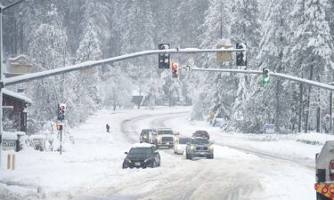 A vehicle is stuck in the snow during a winter storm on December 27 in Grass Valley