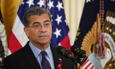 Health and Human Services Secretary Xavier Becerra speaks during a World AIDS Day commemoration in the East Room of the White House in Washington on December 1