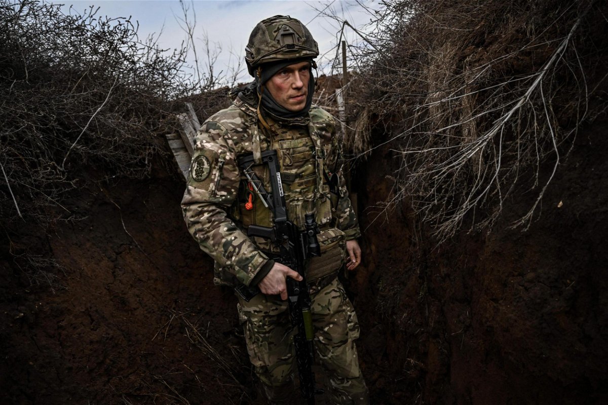 <i>Aris Messinis/AFP/Getty Images</i><br/>Ukrainian troops patrol outside the town of Novoluhanske