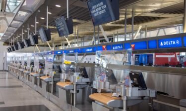 Thousands of flights are canceled as a massive winter storm tears across the United Staes. Photo taken on January 29 shows empty check-in desks at John F. Kennedy International Airport in New York City.