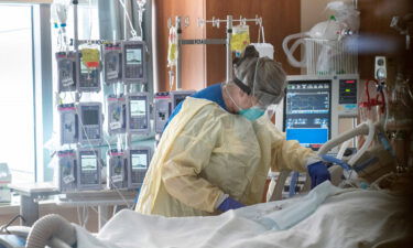 An RN tends to an intubated Covid-19 patient in the intensive care unit of St. Joseph Mercy Oakland Hospital in Pontiac