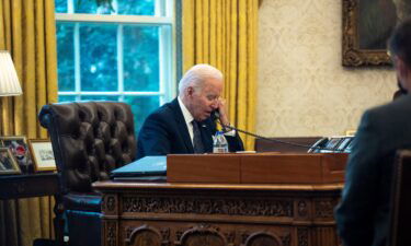 President Joe Biden talks on the phone with Ukrainian President Volodymyr Zelensky from the Oval Office at the White House on December 9