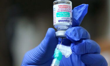 A medical assistant at a University of Washington Medicine clinic prepares a dose of AstraZeneca's Evusheld on January 20