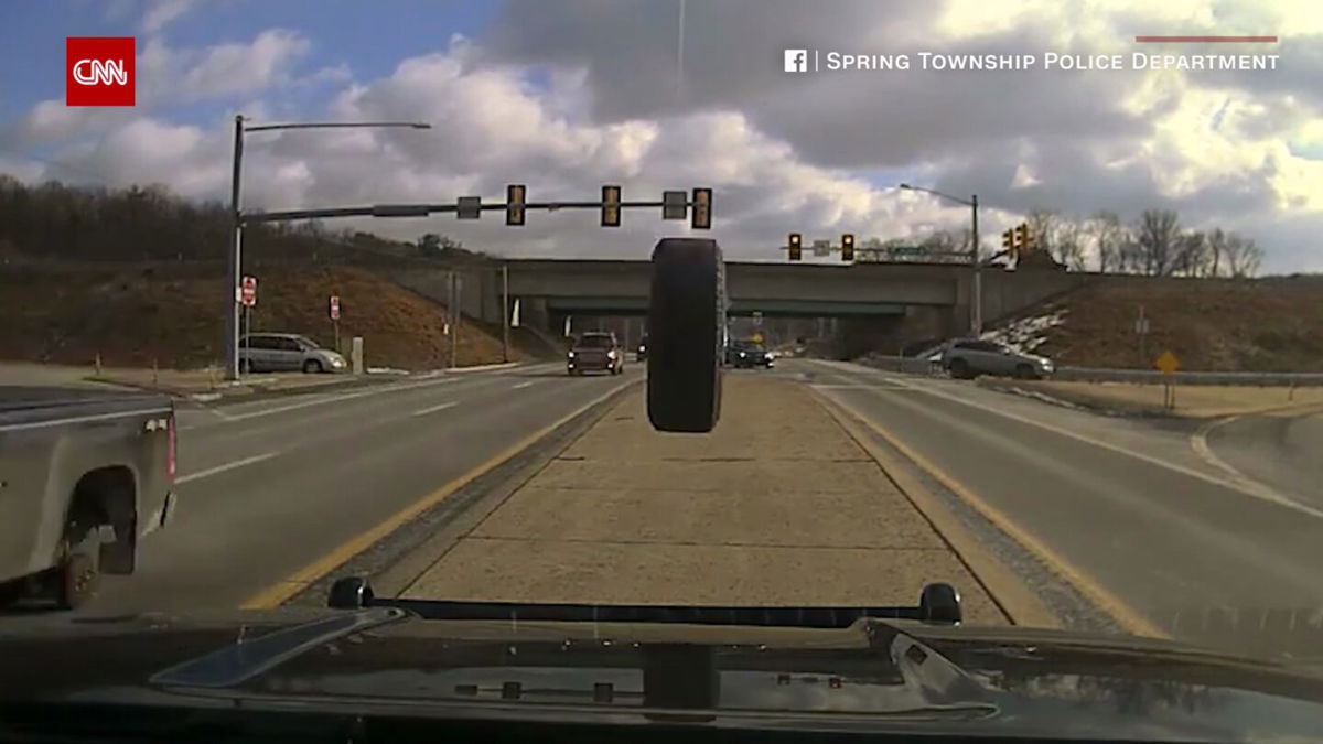 <i>Spring Township Police Department</i><br/>Police dashcam captures a runaway tire smashing into a police vehicle's windshield.