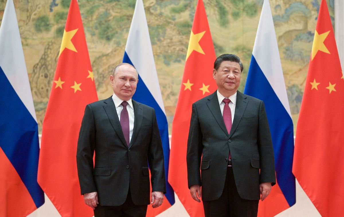 <i>Alexei Druzhinin/Russian Presidential Press/TASS/Reuters</i><br/>Putin and Xi pose during a meeting on Friday in Beijing.